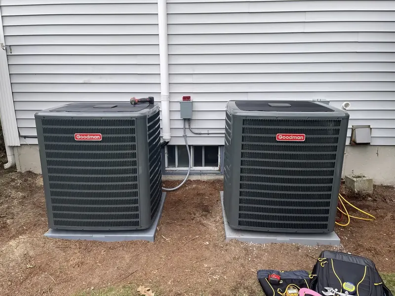 Dual Goodman central air conditioner condensers installed side-by-side by A.J. LeBlanc Heating in Southern NH