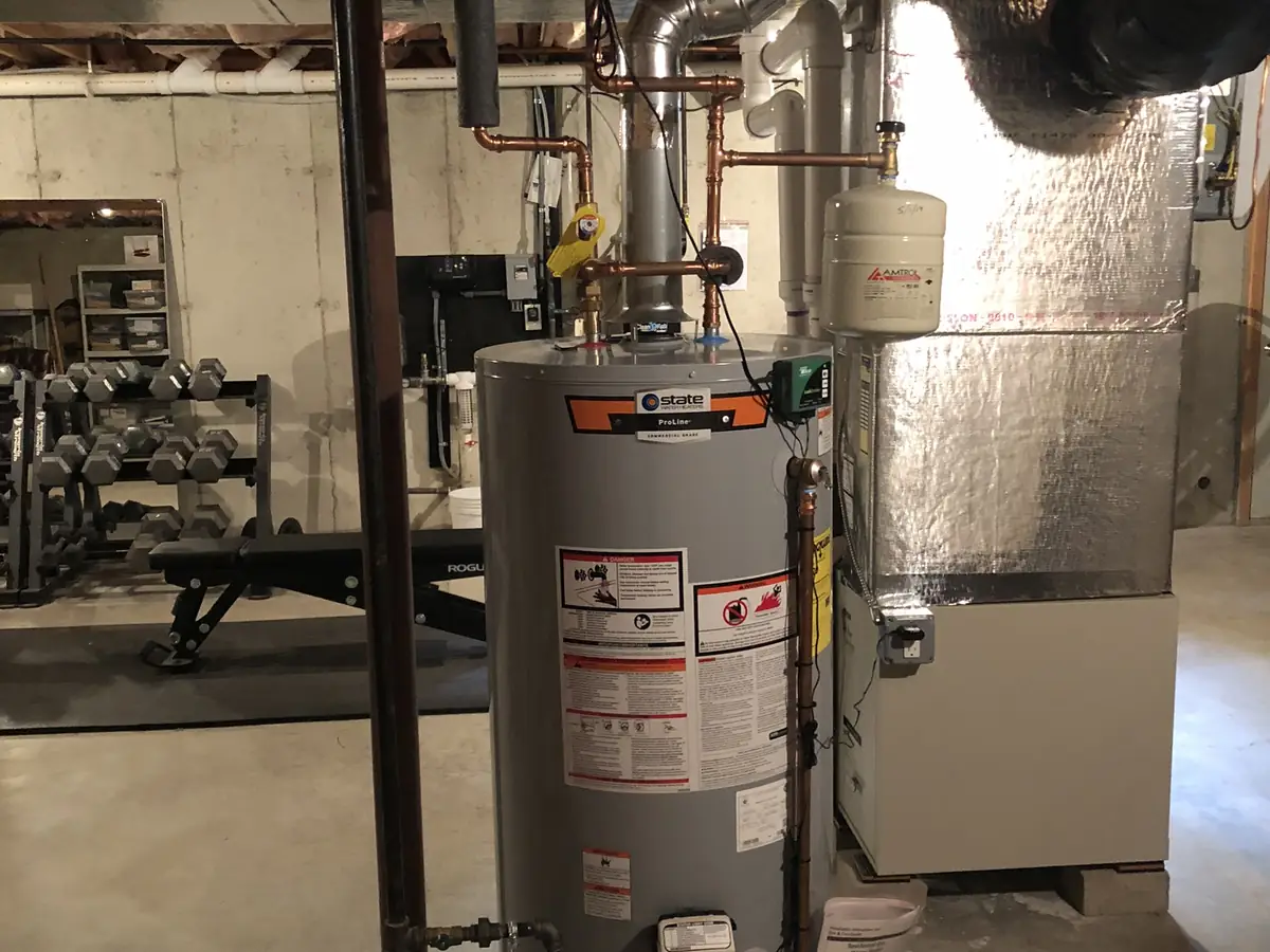 State ProLine gas water heater installation by A.J. LeBlanc Heating licensed plumbers in a Southern NH basement