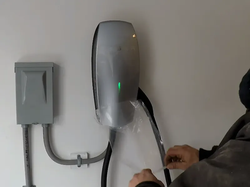 Tesla Wall Connector EV charger installed by an A.J. LeBlanc Heating electrician in Southern NH